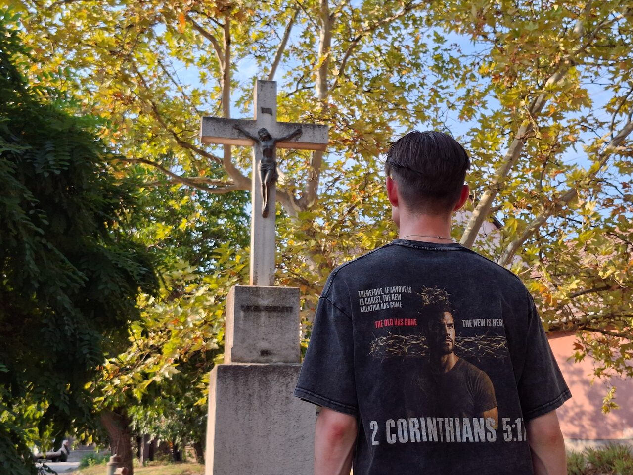 FatherGlorified clothing worn beside the cross