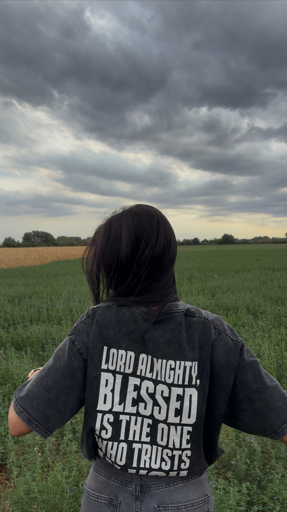 FatherGlorified Truly Blessed tee back design worn outdoors